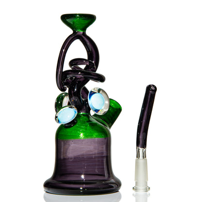 Artistic green and purple glass water pipe with intricate loops and clear glass accents