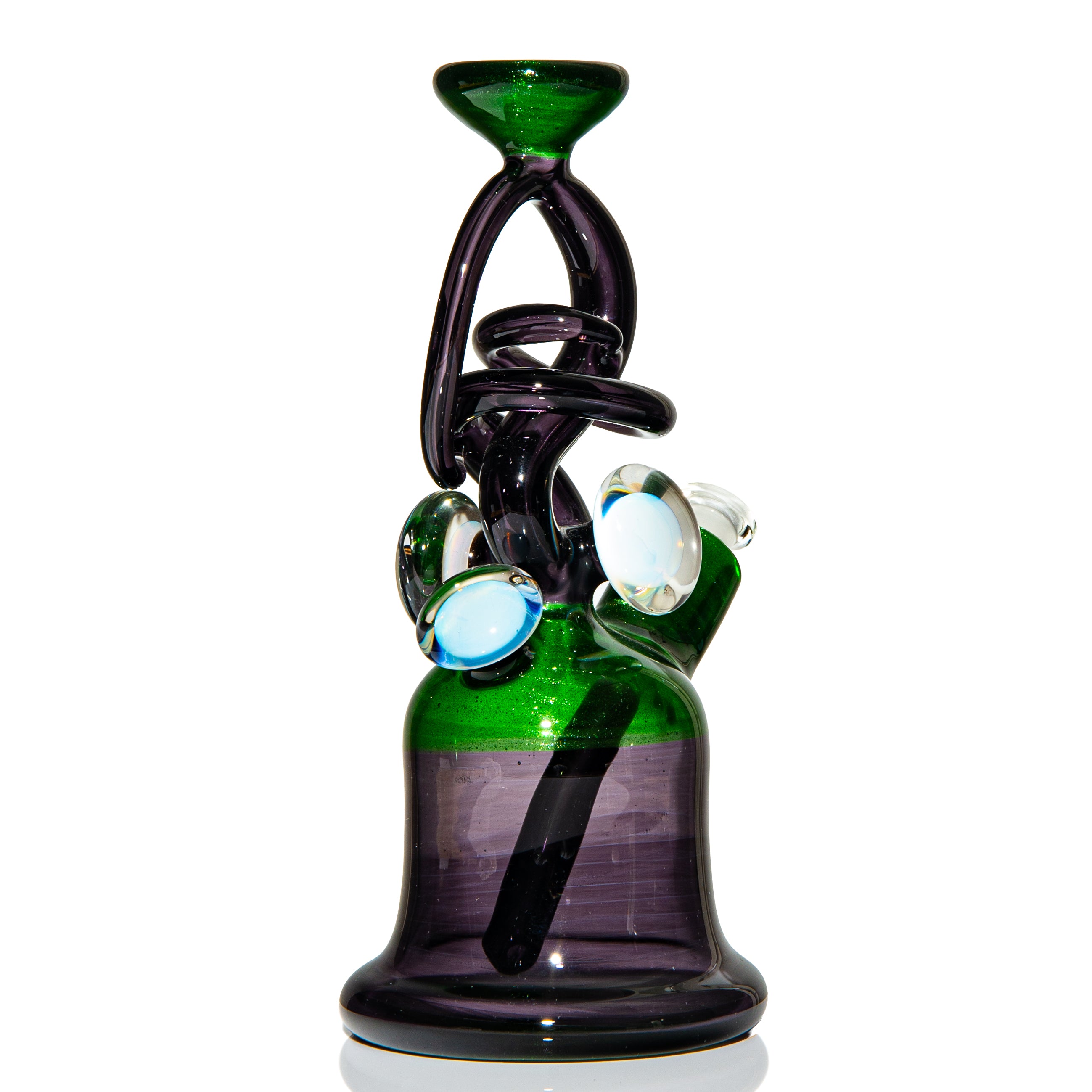 Artistic green and purple glass water pipe with opal accents on white background