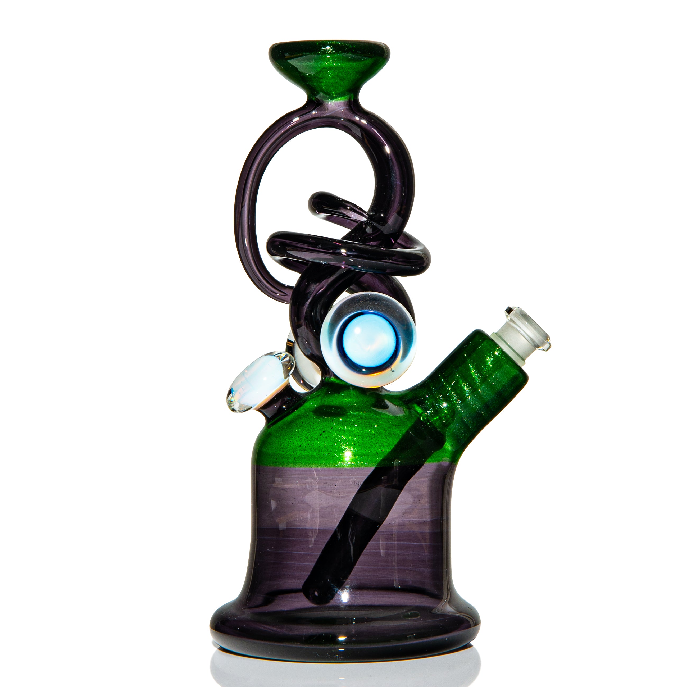 Heady glass rig with green and purple swirled design, artistic glass eye accents