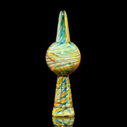 Hand-blown glass carb cap with colorful swirls on black background