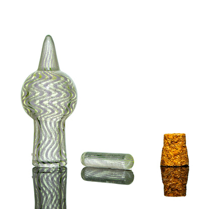 Hand-blown glass smoking accessory with swirl pattern, small glass piece, and cork stopper