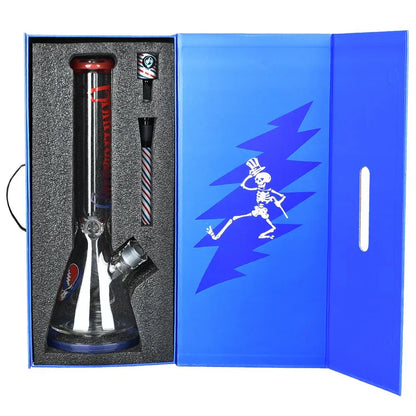 Glass water pipe with Grateful Dead theme in blue box with skeleton design