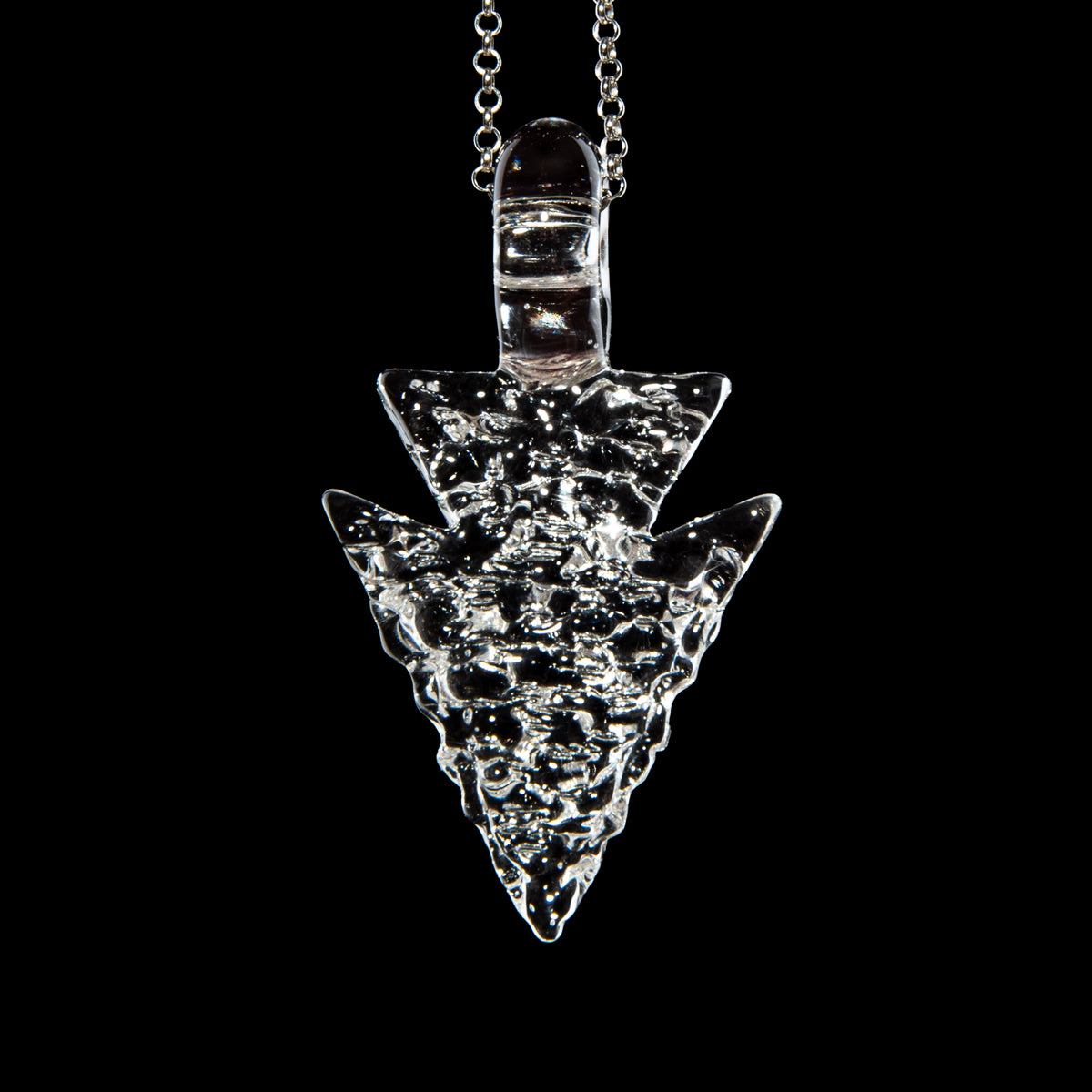 Elks That Run - Electric Flamingo UV Arrowhead Pendant