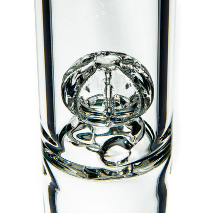 Close-up of intricate clear glass percolator in a premium water pipe