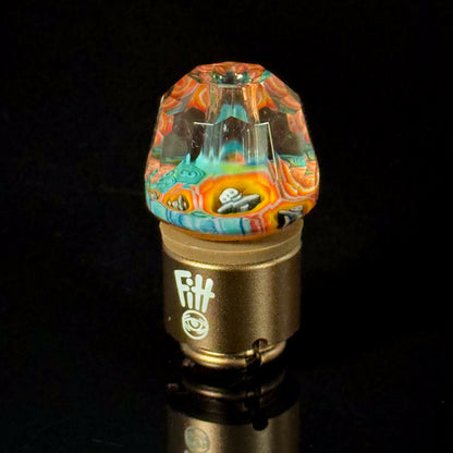 Colorful heady glass carb cap with intricate patterns, displayed on black background