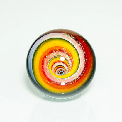Hand-blown glass marble with vibrant rainbow dichroic vortex design, heady glass art