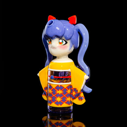 Handcrafted glass art pipe shaped like an anime girl with blue hair and a yellow kimono