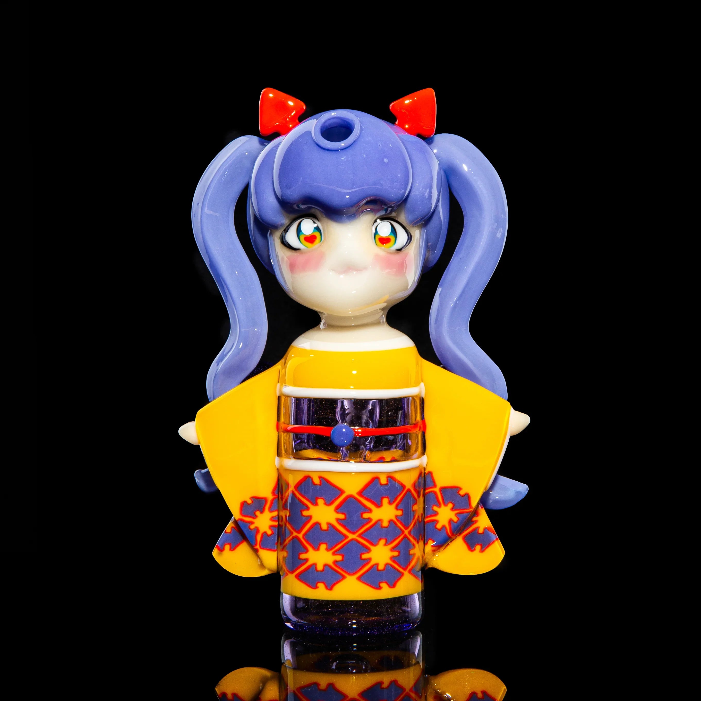 Hand-blown glass art pipe shaped like an anime girl with blue hair and yellow kimono