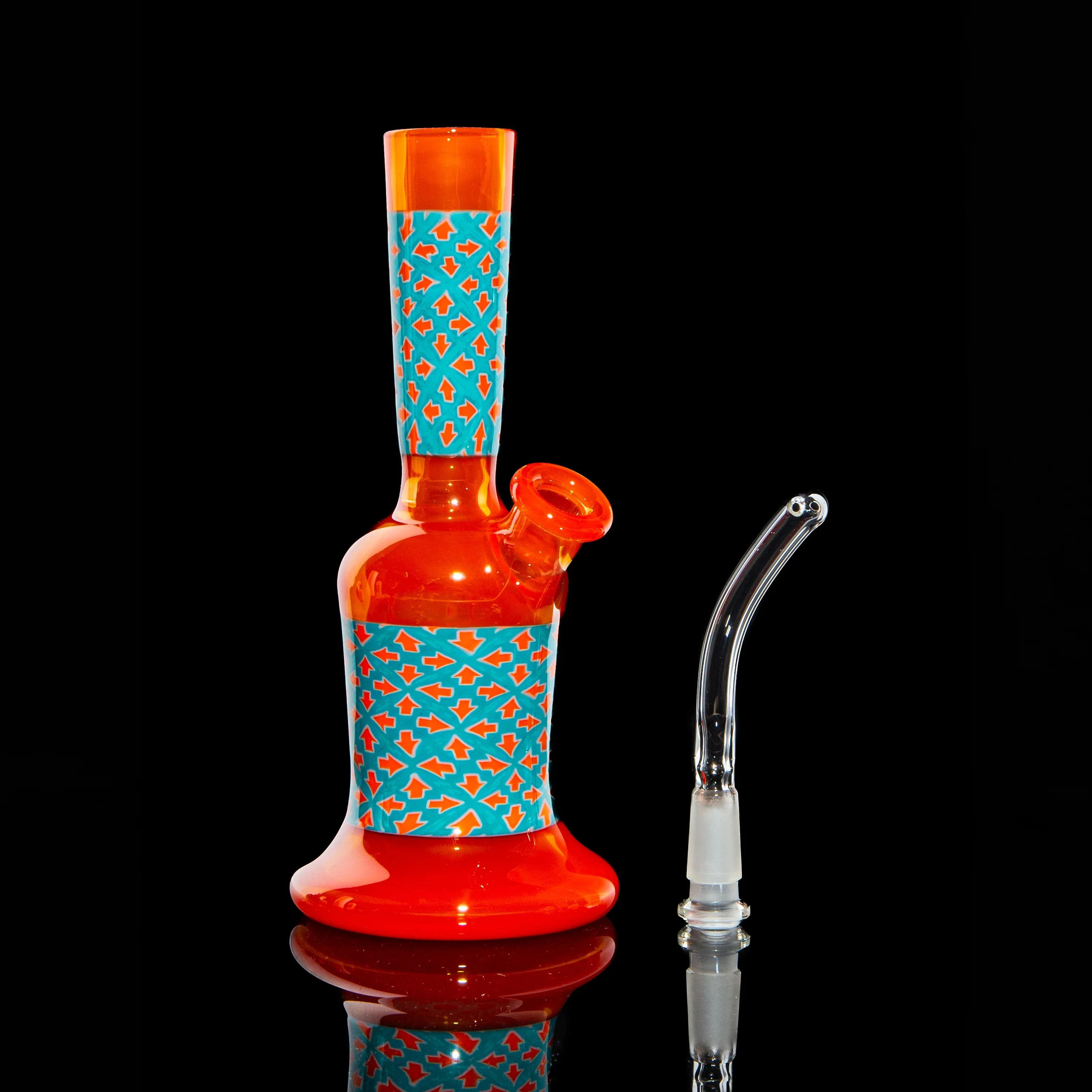 Colorful orange glass water pipe with blue geometric accents and separate clear glass downstem.