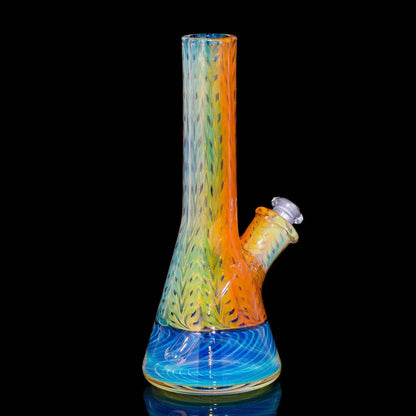 Colorful beaker glass water pipe with spiral blue base and orange-yellow patterns on black background
