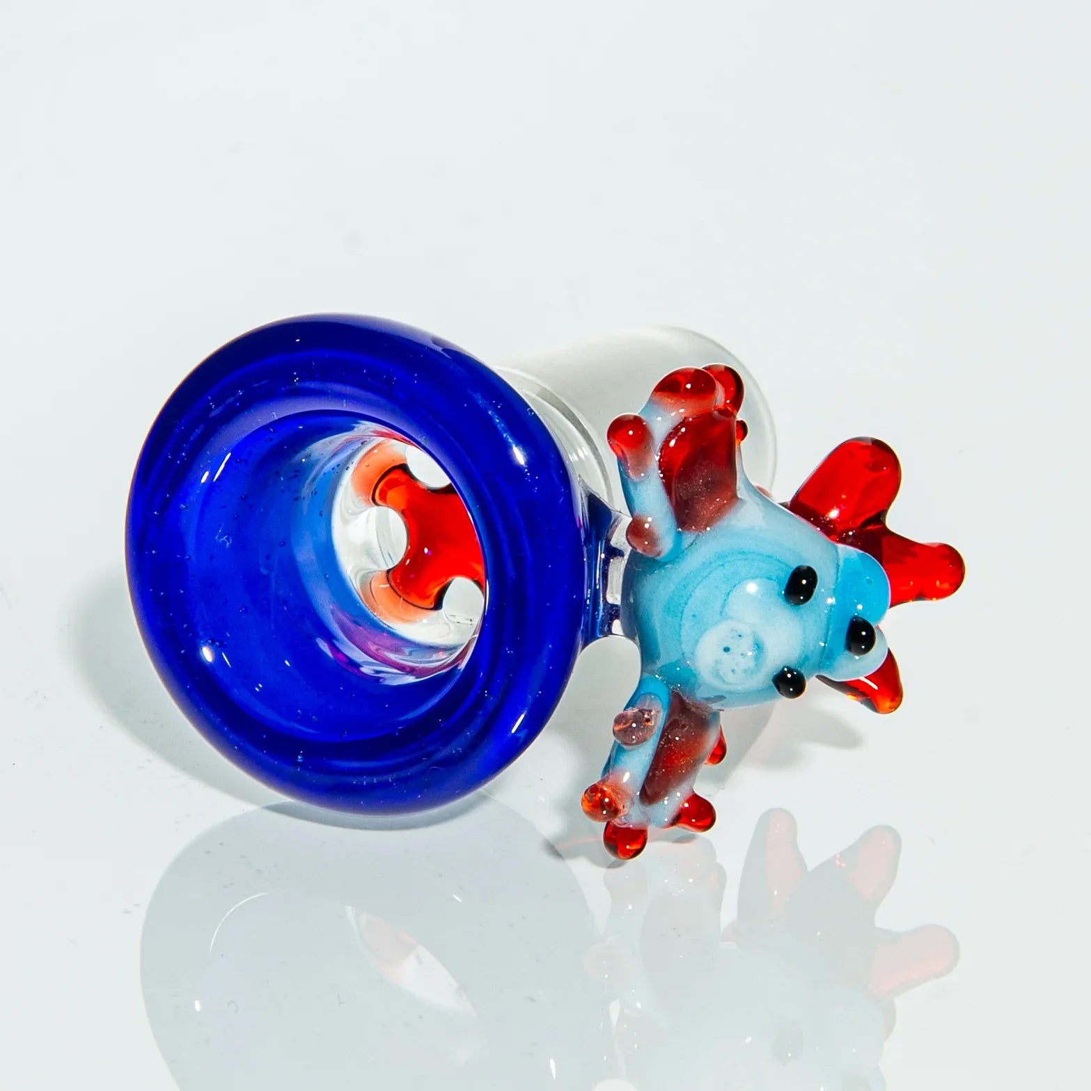 Colorful glass bowl piece with blue rim and red-accented animal design for water pipe