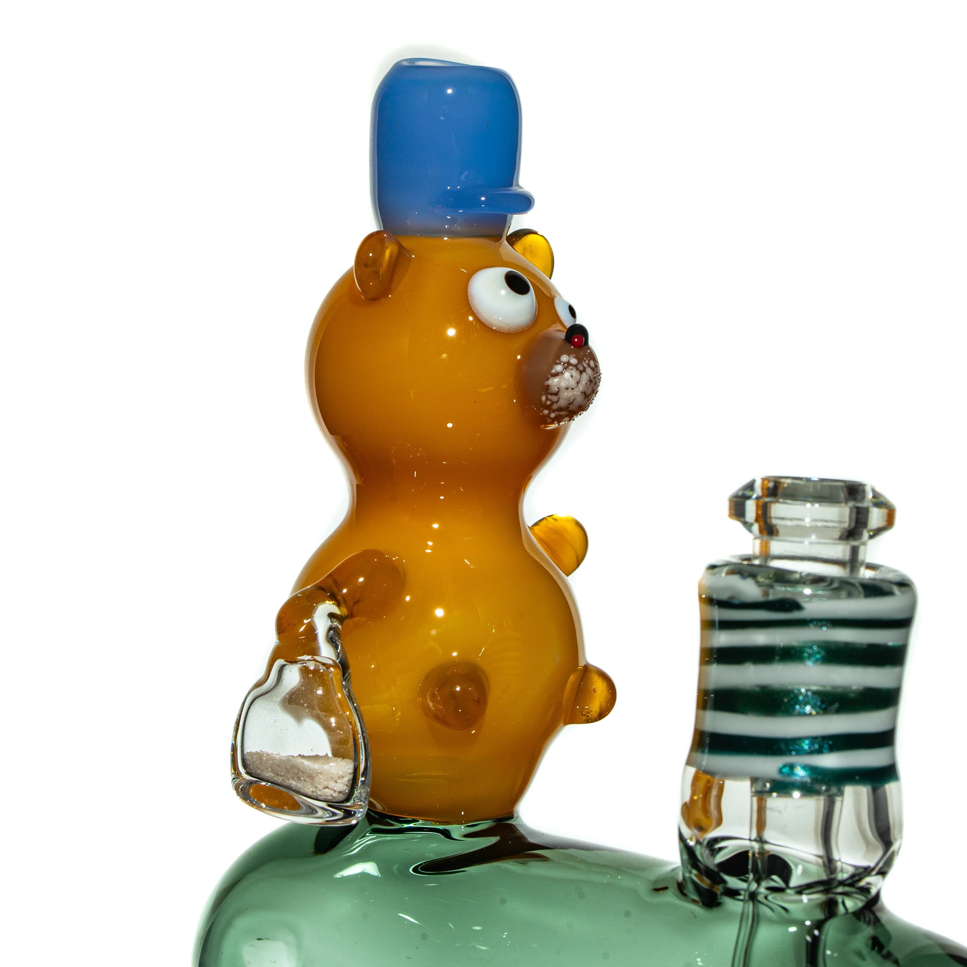 Heady glass bong with cartoon bear figure and blue hat accent detail