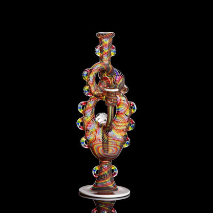 Multicolored glass sculpture on a black background