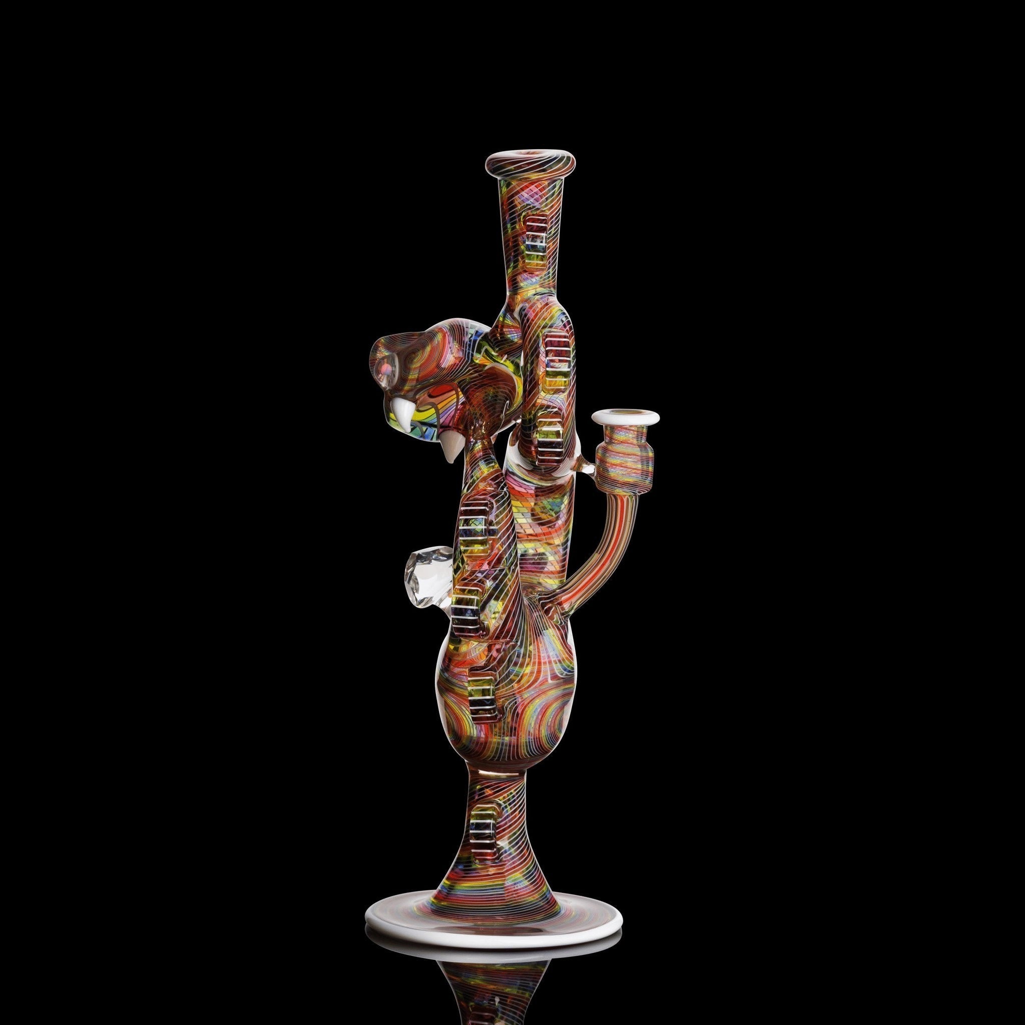 Colorful glass pipe on a black background