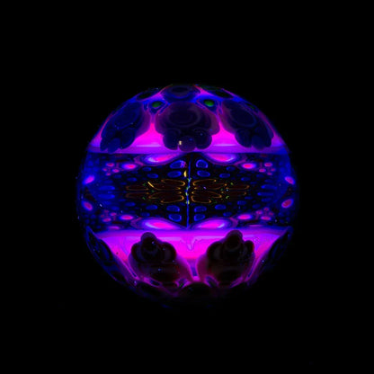 Colorful glass orb with intricate neon patterns and glowing purple and blue accents