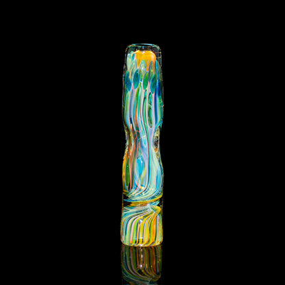Colorful fumed glass one hitter with swirled patterns on a black background