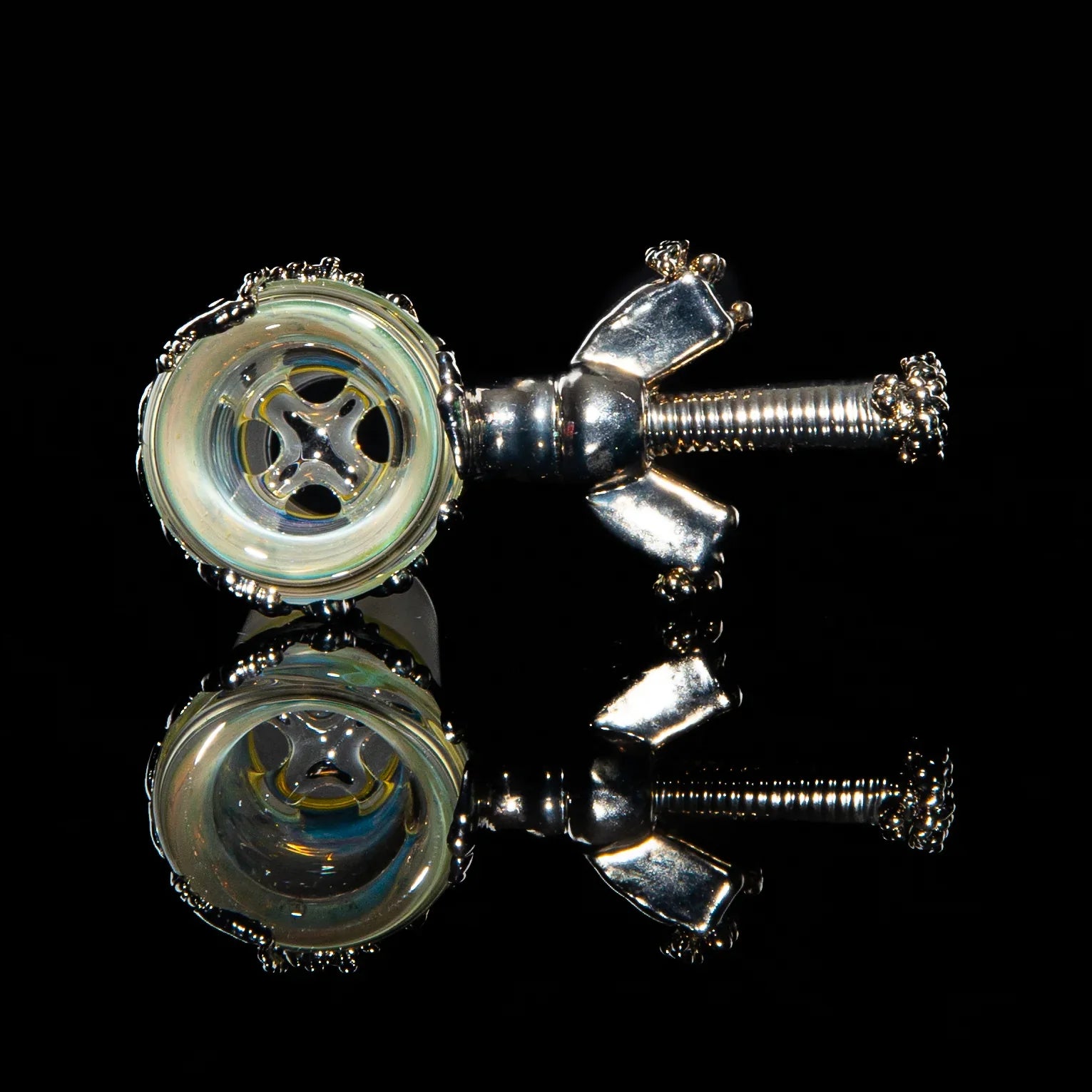 18mm fumed glass slide with four-hole nickel design, reflected on black surface