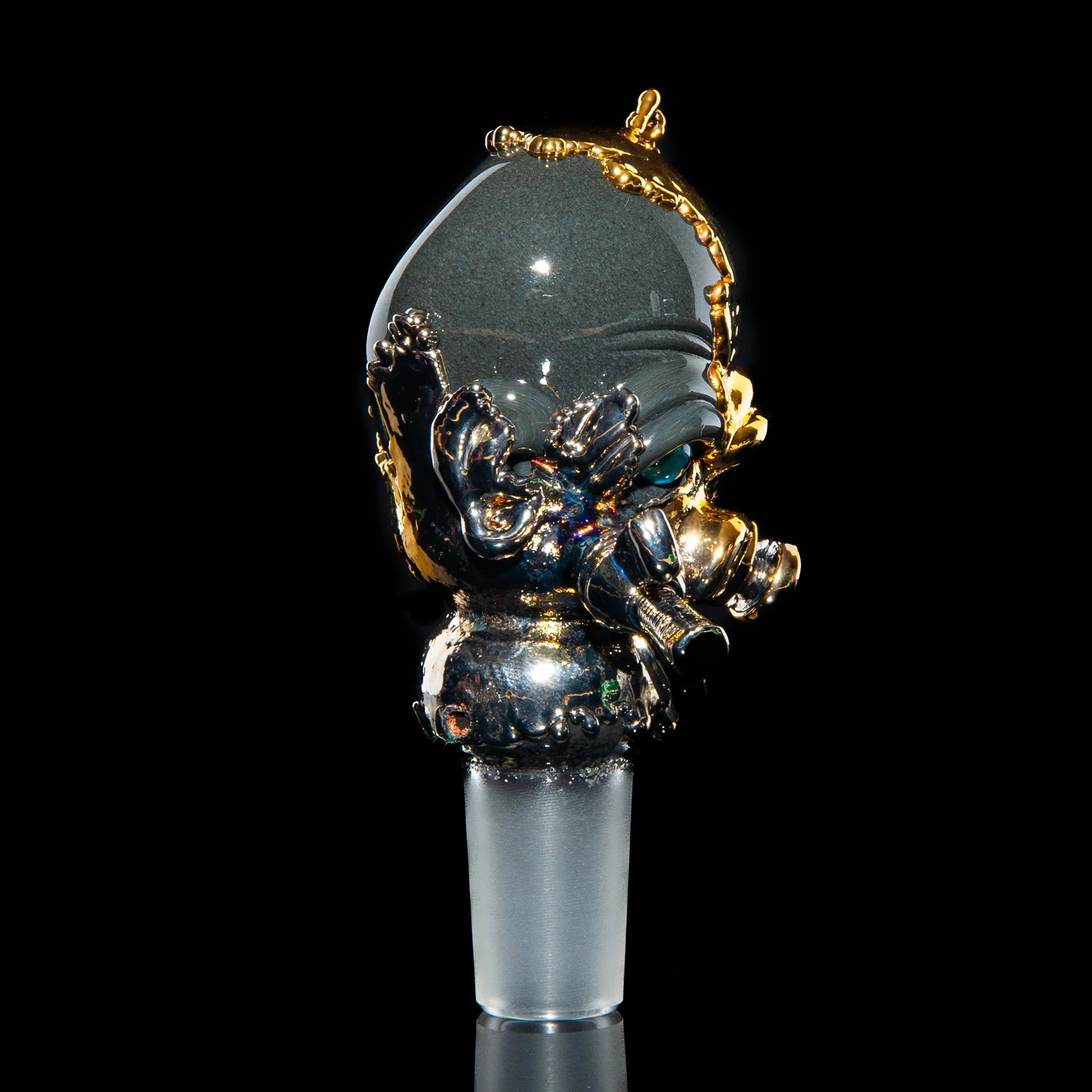 Artistic glass slide with metallic gas mask design, 18mm, displayed on black background