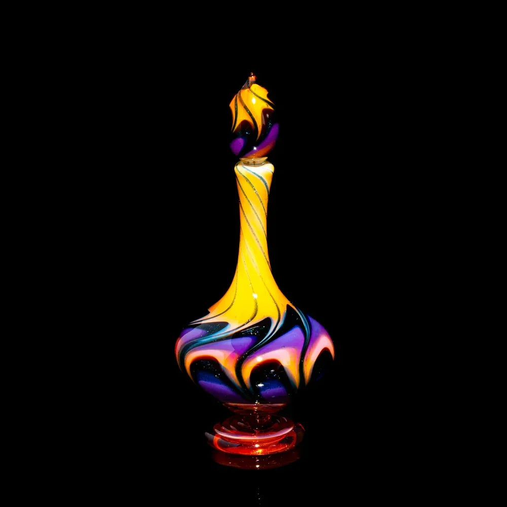 Colorful heady glass art bottle with vibrant swirled patterns on black background