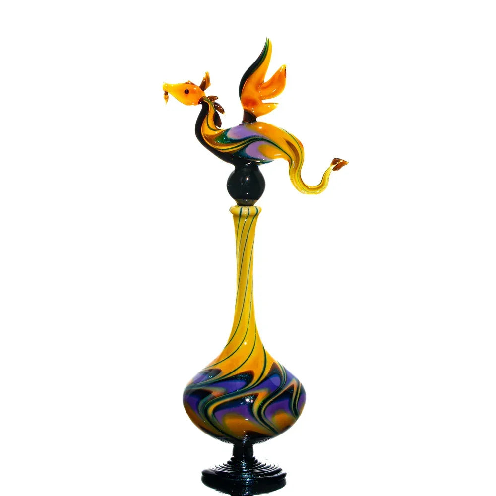 Hand-blown glass art pipe with dragon design, vibrant yellow and swirled patterns