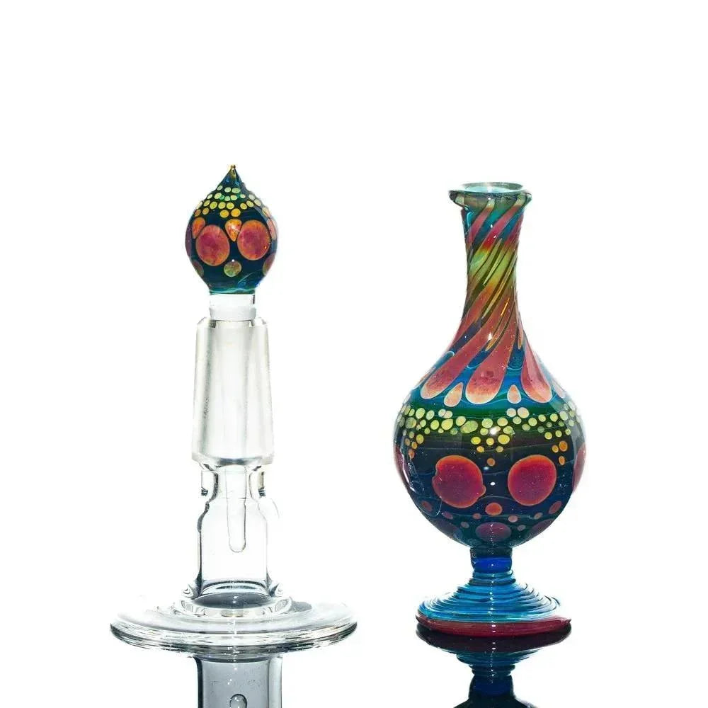 Hand-blown glass perfume jar with colorful bubble pattern and matching decorative stopper.