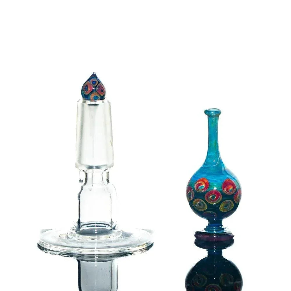 Colorful hand-blown perfume jar with stopper, swirled blue and multicolor glass design
