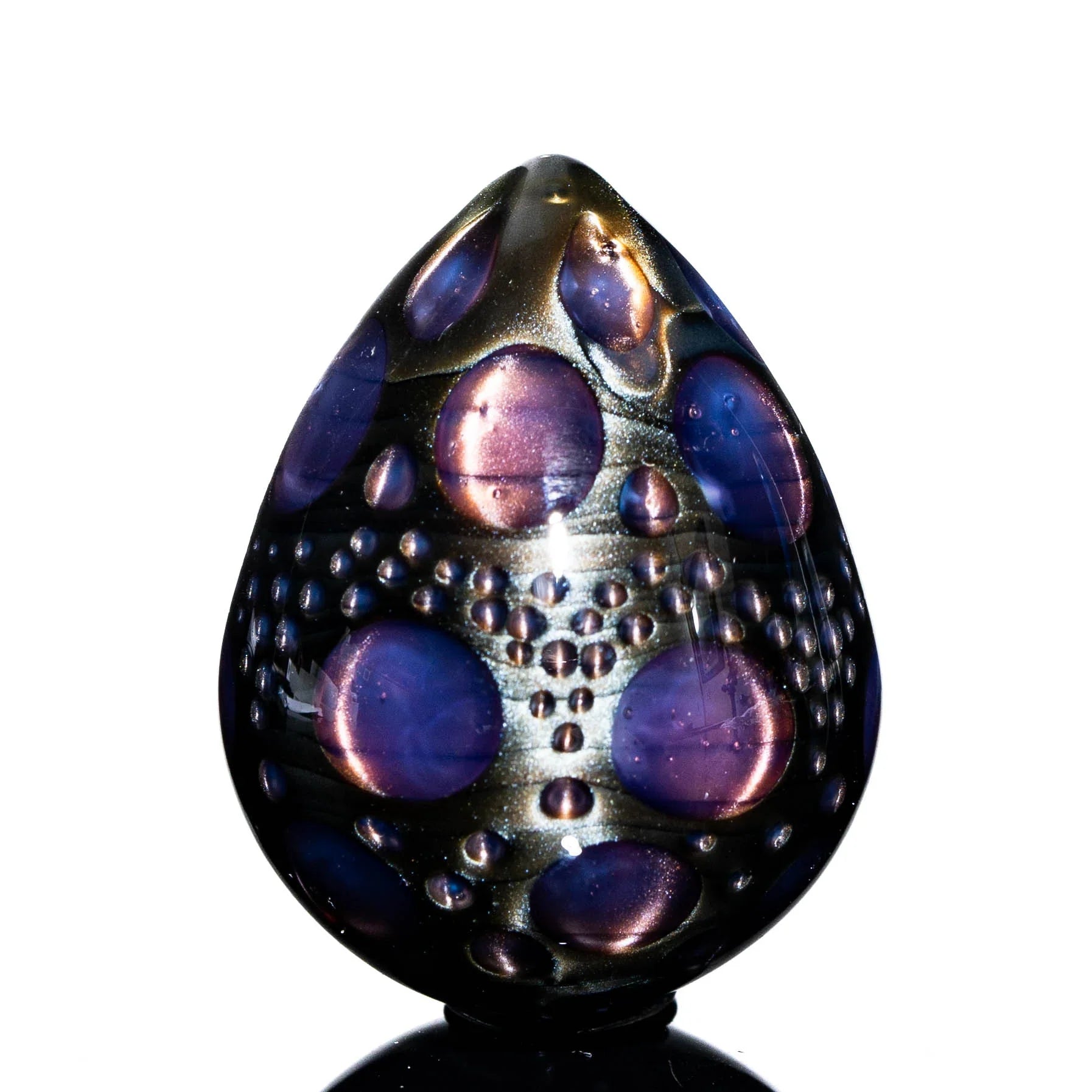 Handcrafted glass egg with purple and blue metallic bubble details, art glass collectible