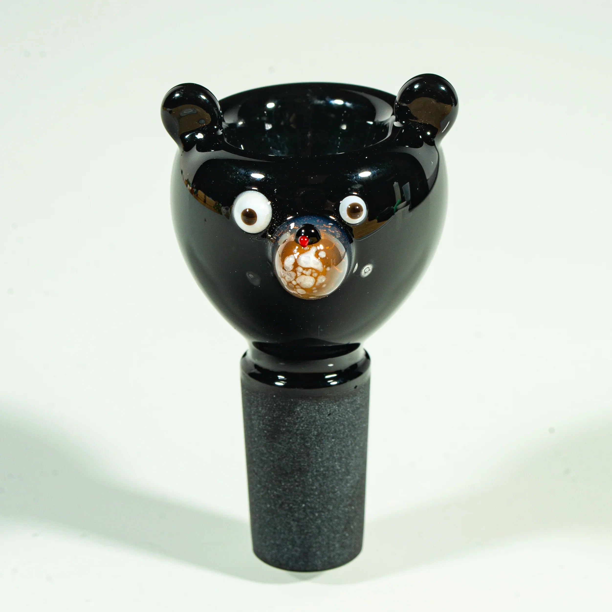 Handcrafted glass bowl slide shaped like a black bear head, 14mm male joint accessory.