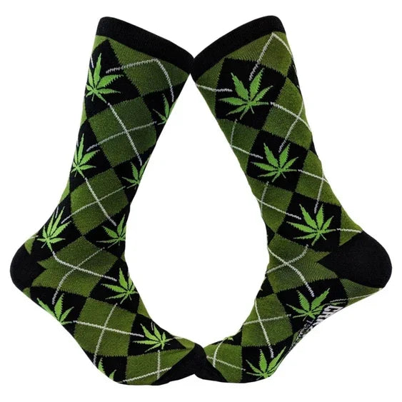 Green argyle socks with leaf pattern, black accents, novelty apparel accessory