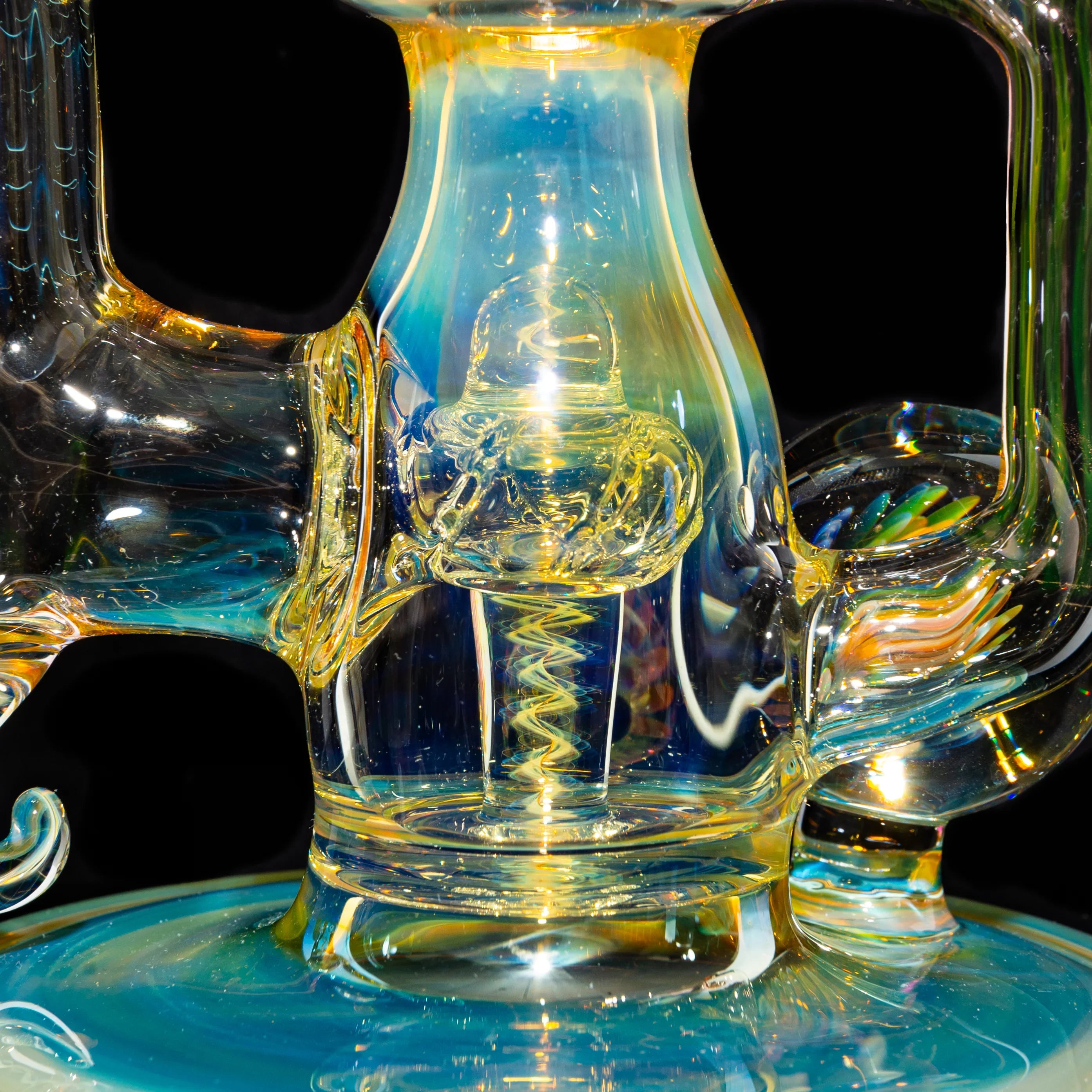 Close-up of intricate, colorful heady glass water pipe with detailed percolator design