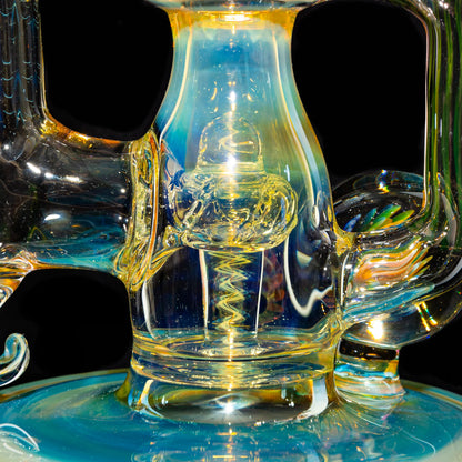 Close-up of intricate, colorful heady glass water pipe with detailed percolator design