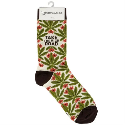 Novelty crew sock with green leaf pattern, red accents, and 'Take the High Road' text.