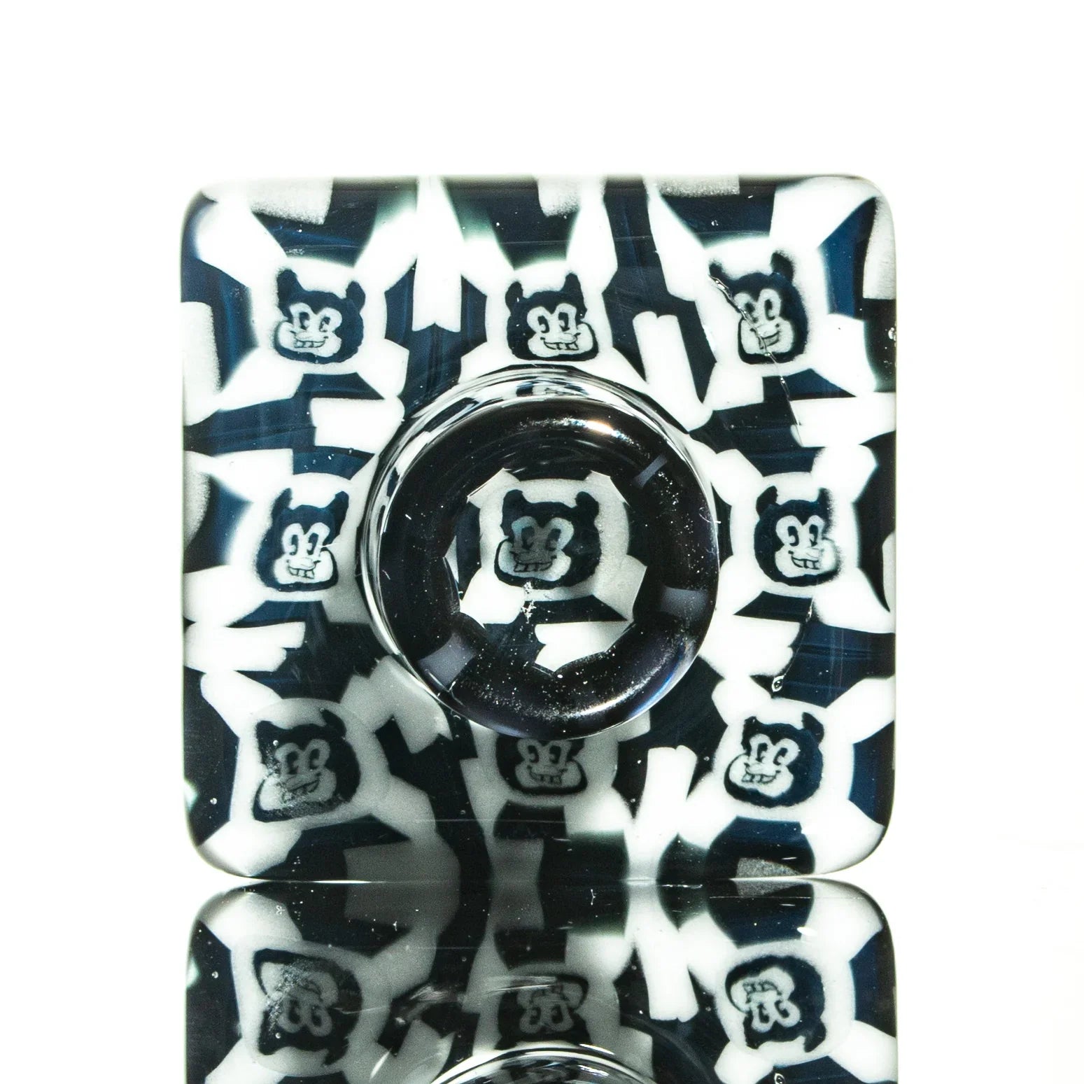 Square glass dish with cartoon bear faces and black and white pattern, glass accessory