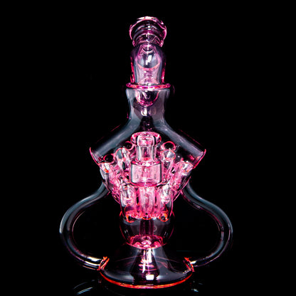 Intricate pink glass water pipe with detailed percolator on a black background