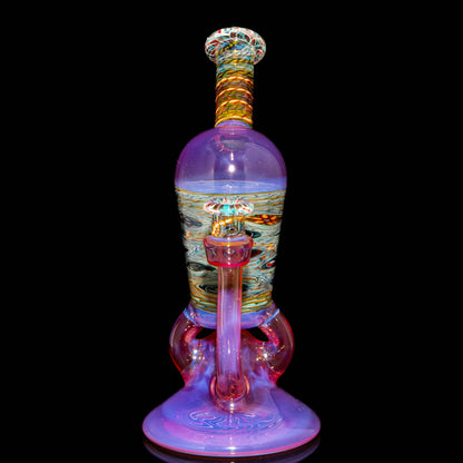 Colorful heady glass water pipe with intricate swirled patterns and iridescent finish