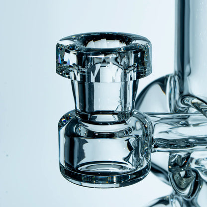 Closeup of clear glass bong bowl with thick, detailed glasswork for smoking accessories