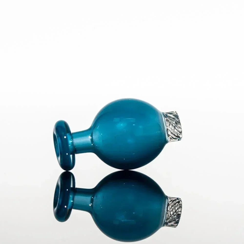 Teal glass pipe with textured silver mouthpiece, reflective surface