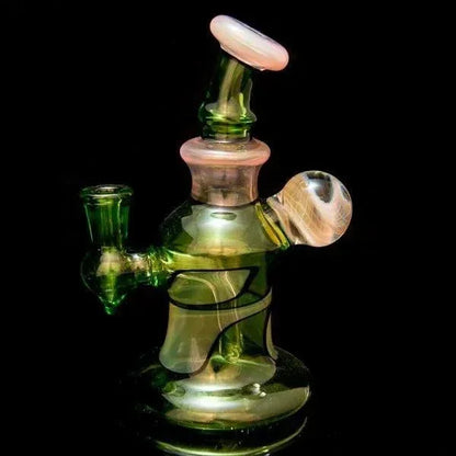 Green and pink heady glass pipe with intricate swirls and dual chambers