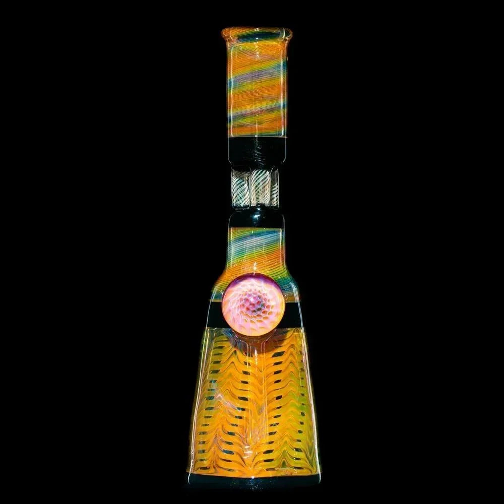 Heady glass water pipe with vibrant fume patterns and a triple pillar perc, displayed on black background