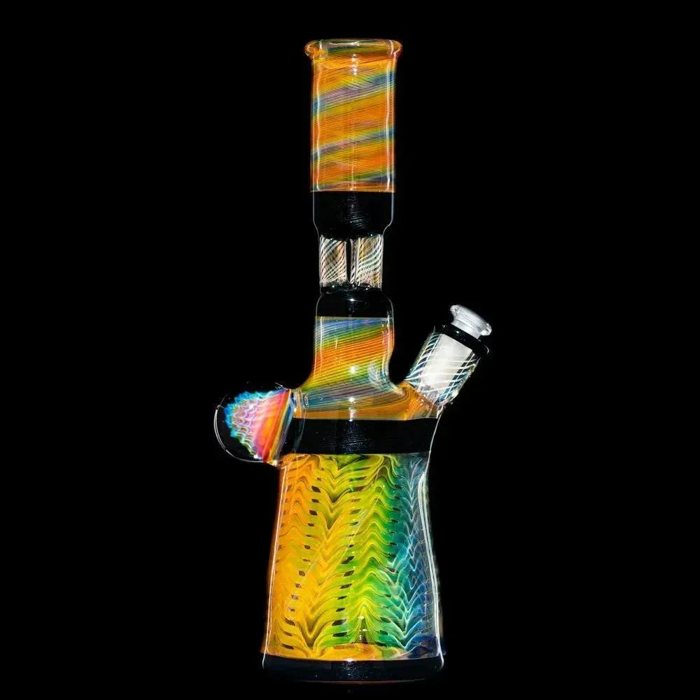 Colorful glass water pipe with triple pillar perc and vibrant rainbow patterns on black background