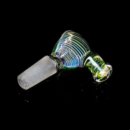 Colorful glass slide bowl with swirling line patterns on a black background