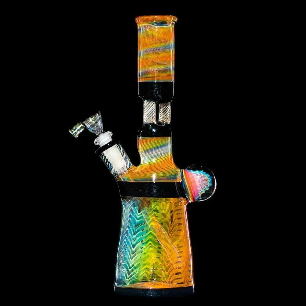 Colorful glass water pipe with triple pillar perc and slide, intricate patterns, black background