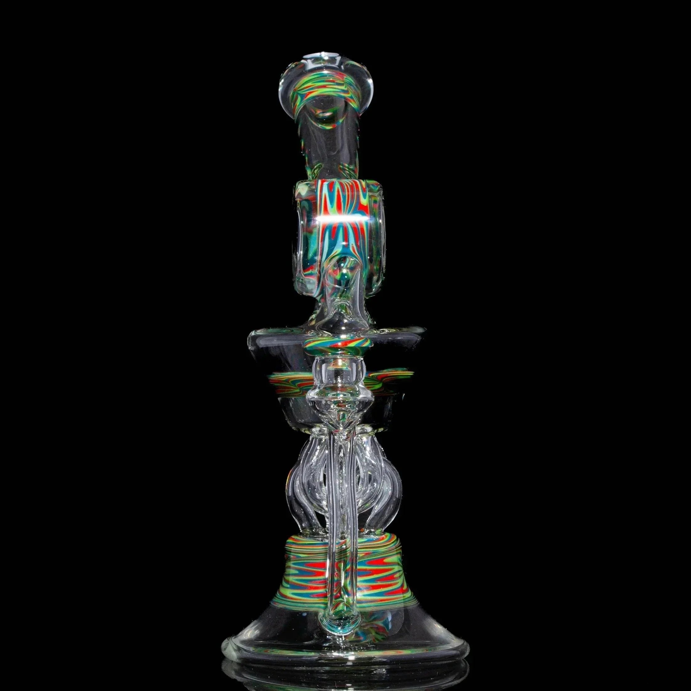 Heady glass water pipe with colorful linework accents on black background