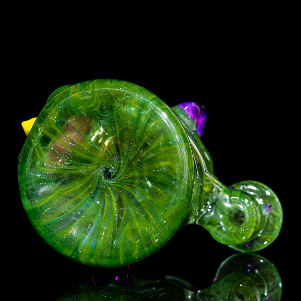 Kaleb Folck - Cara verde con boca abierta y tapa de burbuja