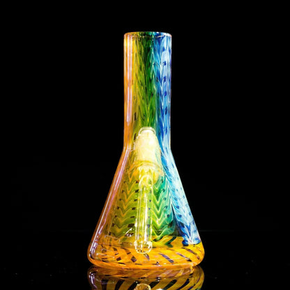Rainbow glass bong with vibrant swirls and reflective base