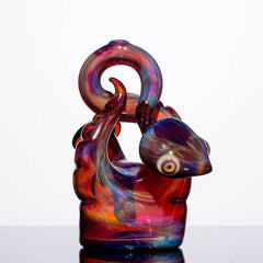 product shot of glass snake by Niko Cray in Amber Purple