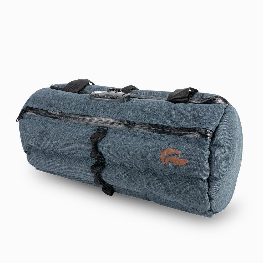 Navy blue duffle tube bag with zipper closure, lock feature, and side logo, isolated on white
