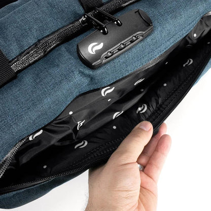 Close-up of a navy duffle bag with a front zipper and built-in combination lock