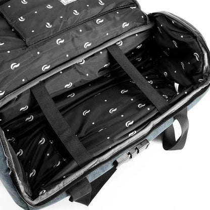 Open navy duffle bag with patterned, padded black interior and adjustable straps