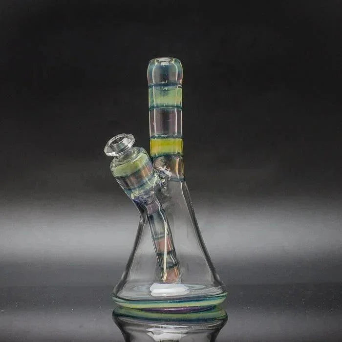 Hand-blown glass water pipe with colorful striped removable downstem, black background